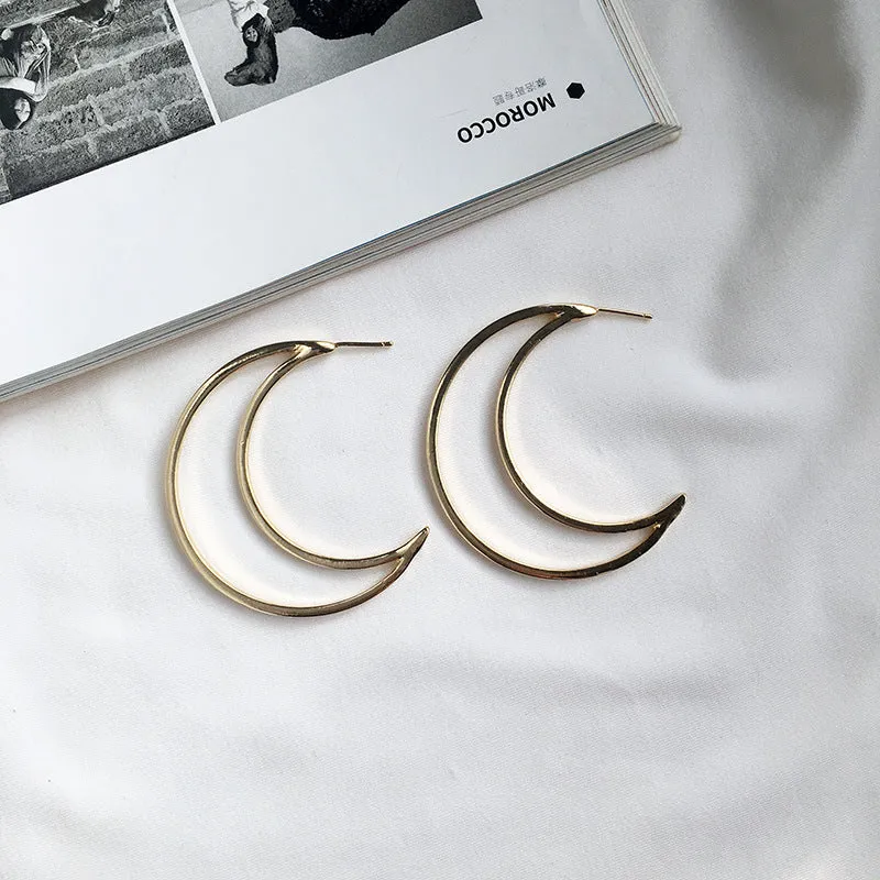 Shimmering Night Sky Crescent Earrings with Geometric Touch