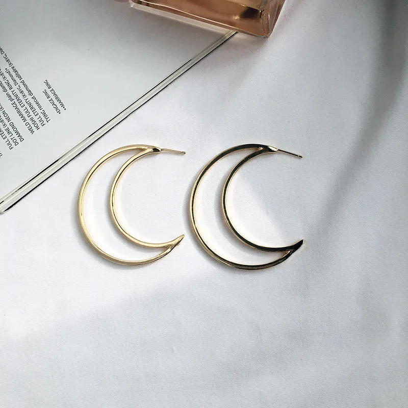 Shimmering Night Sky Crescent Earrings with Geometric Touch